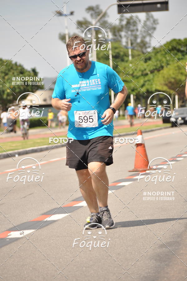 Buy your photos of the event21KES - Meia Maratona do Esprito Santo on Fotop