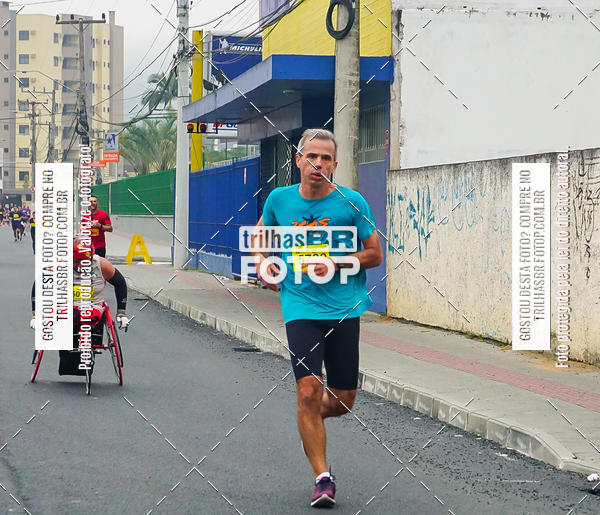 Buy your photos of the eventMeia Maratona de Blumenau on Fotop