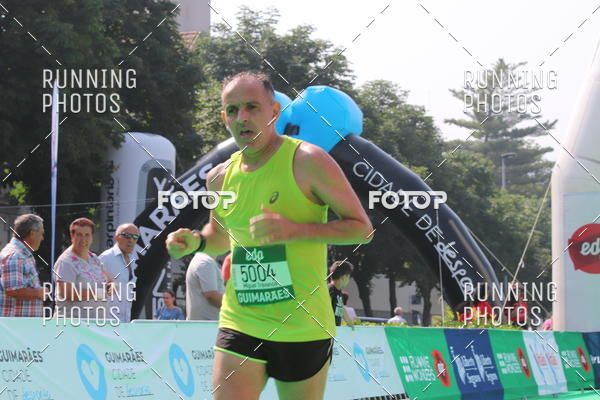 Buy your photos of the eventMeia Maratona Guimares on Fotop