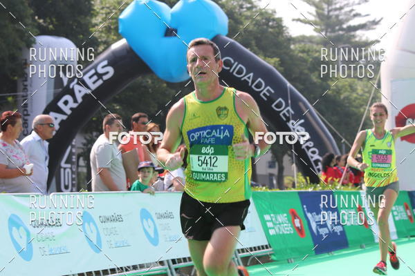 Buy your photos of the eventMeia Maratona Guimares on Fotop