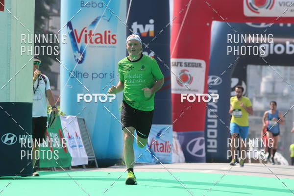 Buy your photos of the eventMeia Maratona Guimares on Fotop